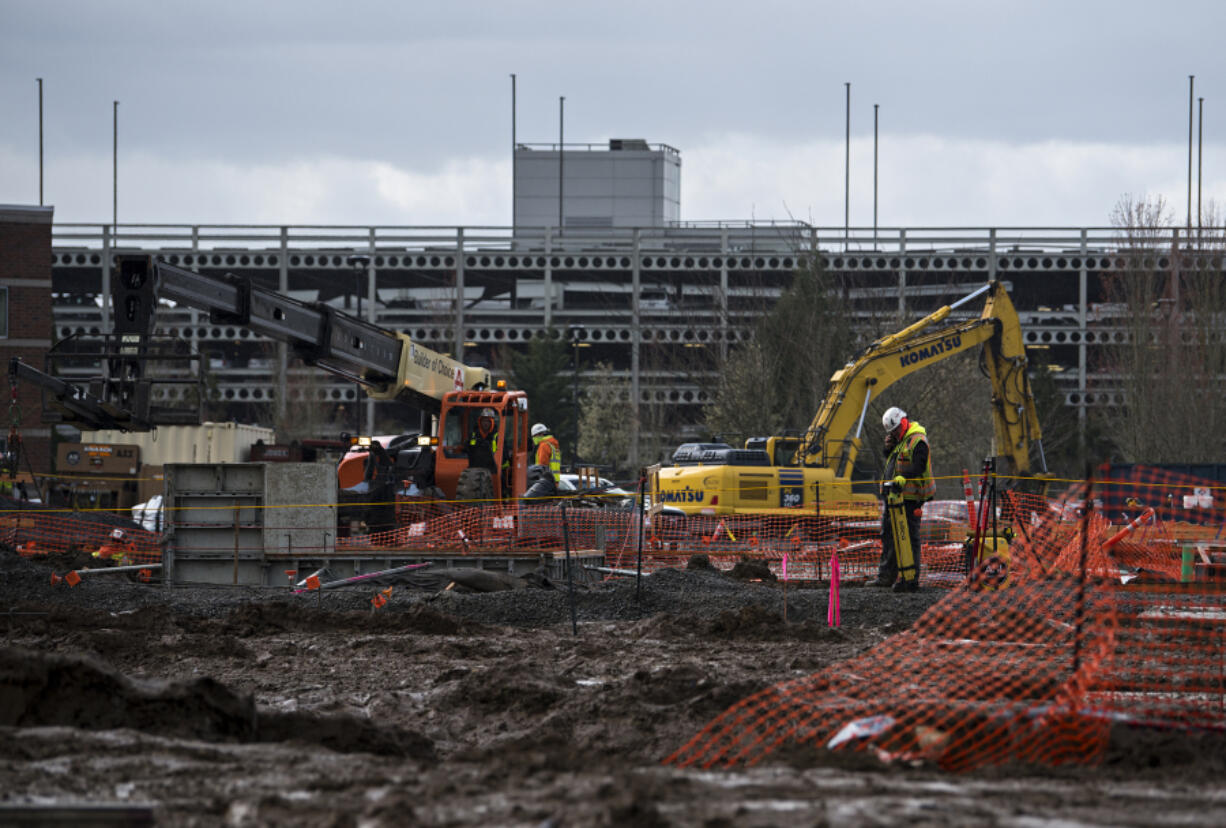 Workers from Andersen Construction help build a second building at the Vancouver Clinic&#039;s Salmon Creek campus. The building is the last and largest in a series of projects outlined in a strategic growth plan that the clinic adopted in 2015.