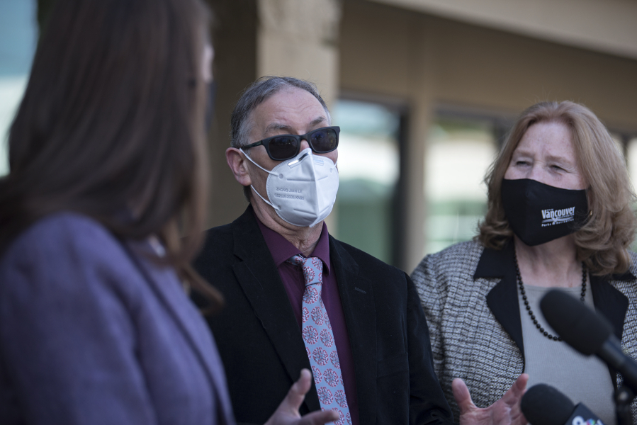 Rep. Jaime Herrera Beutler, from left, joins Dr. Alan Melnick and Mayor Anne McEnerny-Ogle as they answer questions from the press at the Tower Mall vaccination site Monday.