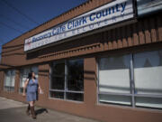 Nicholl Acosta-Alaspa of Vancouver walks at Recovery Cafe Clark County in Vancouver. Acosta-Alaspa has gone through the difficult process of recovery during the pandemic, which has been a lonelier, less stimulating time for most people.