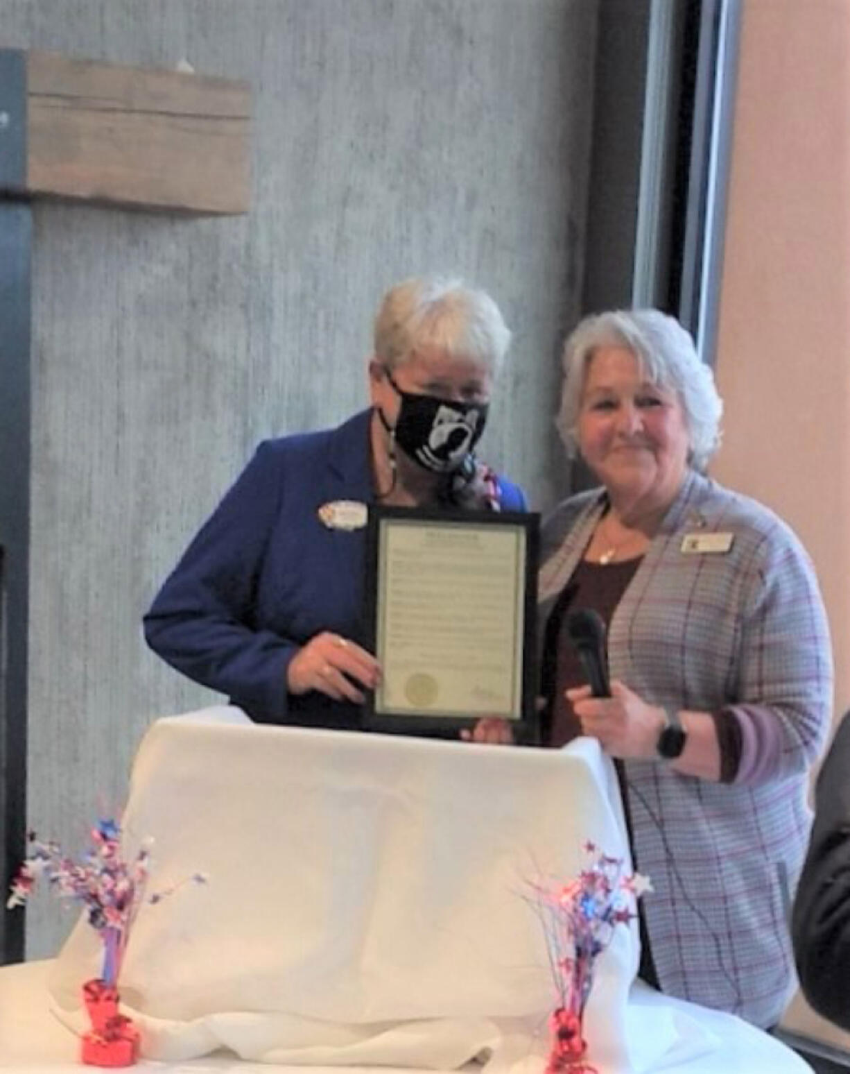 WASHOUGAL: President of the Veterans of Foreign Wars Auxiliary Sandi Onstwedder, left, met with Mayor of Washougal Molly Coston during a dinner at the Black Pearl on the Columbia.