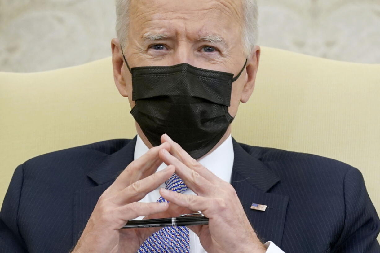 President Joe Biden speaks during a meeting with lawmakers to discuss the American Jobs Plan in the Oval Office of the White House, Monday, April 12, 2021, in Washington.