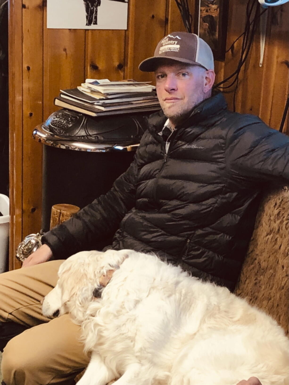 Charles "Carl" Mock is seen in an undated photo inside the offices of Backcountry Adventures, a guided snowmobile tour company that he worked at in West Yellowstone, Mont. (Jerry D.