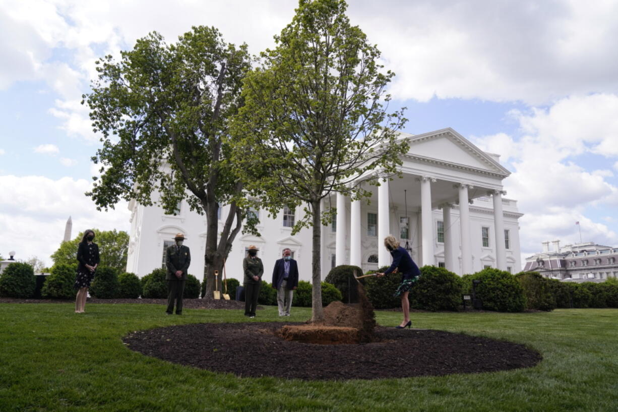 First lady Jill Biden participates in an Arbor Day tree planting ceremony at the White House, Friday, April 30, 2021, in Washington.