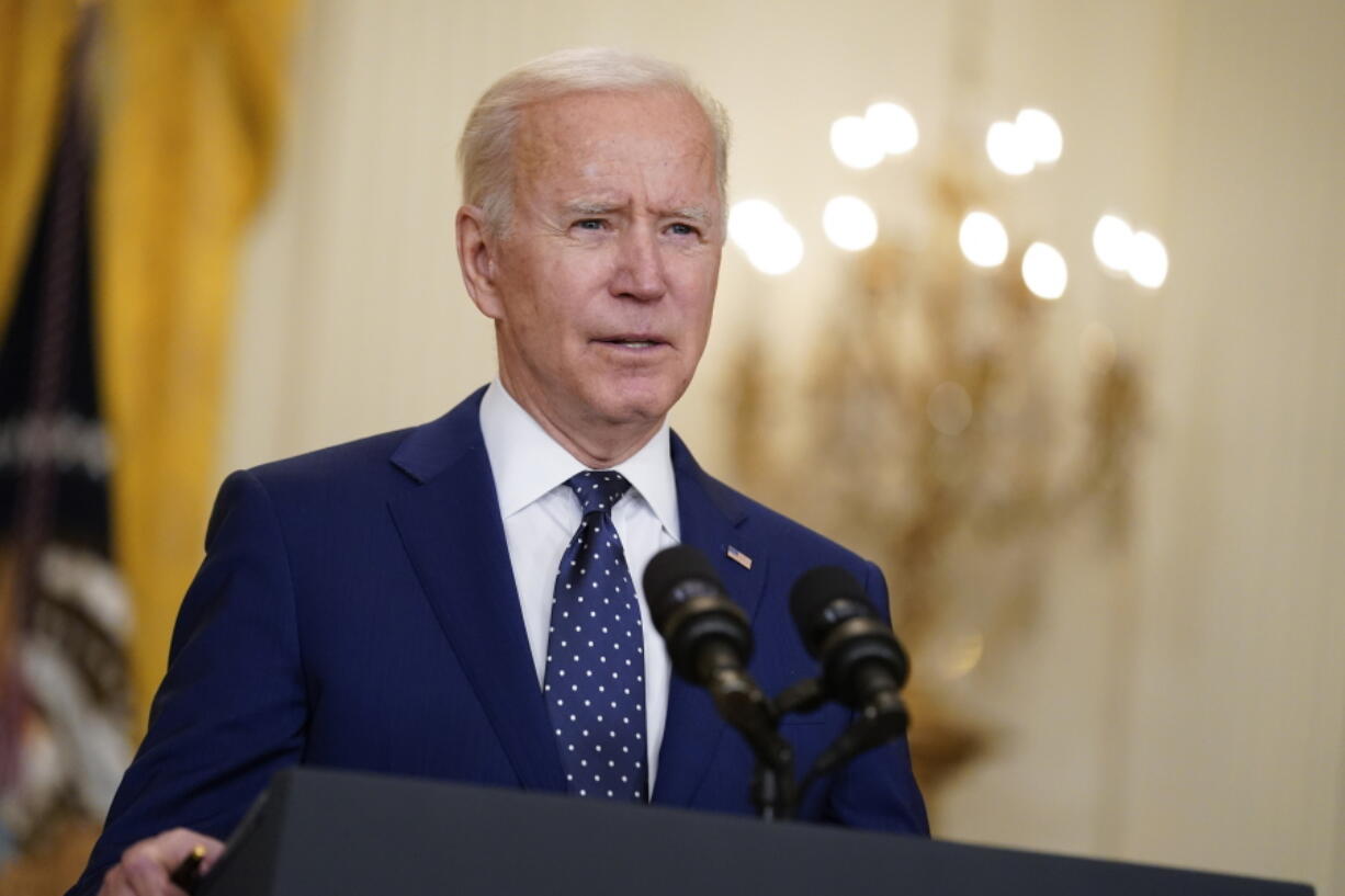 FILE - In this April 15, 2021, file photo, President Joe Biden speaks in the East Room of the White House in Washington. No nation offers asylum or other protections to people displaced because of climate change. Biden's administration is studying the idea, and climate migration is expected to be discussed at his first climate summit.