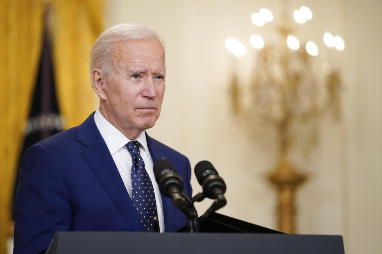 FILE - In this April 15, 2021, file photo President Joe Biden speaks about Russia in the East Room of the White House in Washington. In recent days, Biden has piled new sanctions on Russia, announced he would withdraw all U.S. troops from Afghanistan in less than five months and backed away from a campaign promise to sharply raise refugee admission caps.