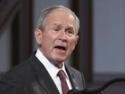 FILE - In this July 30, 2020 file photo, former President George W. Bush speaks during the funeral service for the late Rep. John Lewis, D-Ga., at Ebenezer Baptist Church in Atlanta.