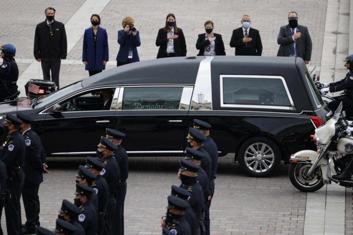 A hearse carrying the casket of slain U.S. Capitol Police officer William &quot;Billy&quot; Evans arrives at the Capitol, Tuesday, April 13, 2021 in Washington.