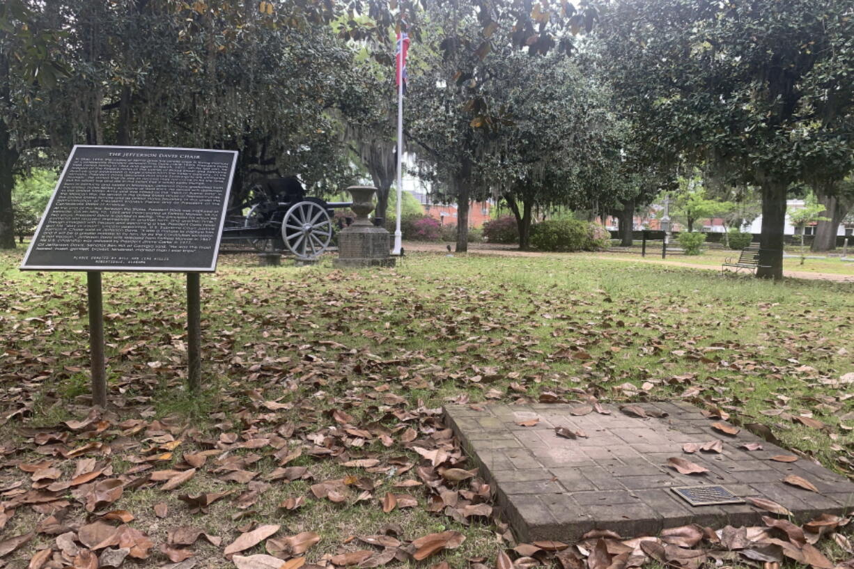 A brick base sits empty Tuesday, April 13, 2021, where chair carved out of limestone honoring Confederate President Jefferson Davis was stolen from Confederate Memorial Circle, a private section of Live Oak Cemetery in Selma, Ala. Police recovered the chair in New Orleans.