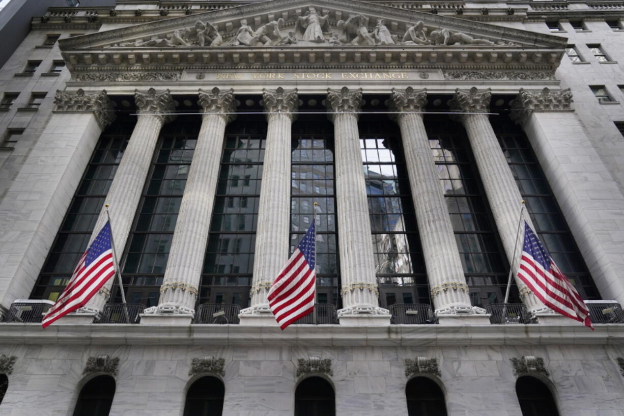 FILE - The New York Stock Exchange is seen in New York, Monday, Nov. 23, 2020.  On Wednesday, April 28, President Joe Biden is expected to propose doubling the tax rate that the highest-earning Americans pay on profits made from stocks and other investments.