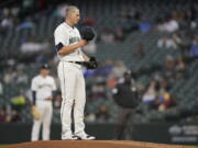 Seattle Mariners starting pitcher Chris Flexen pauses on the mound during the third inning of the team&#039;s baseball game against the San Francisco Giants, Saturday, April 3, 2021, in Seattle. (AP Photo/Ted S.