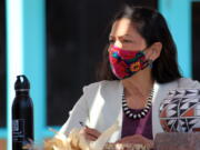 FILE - In this April 6, 2021, file photo, U.S. Interior Secretary Deb Haaland listens to tribal leaders and jots down notes during a round-table discussion at the Indian Pueblo Cultural Center in Albuquerque, N.M. Secretary Haaland will visit Utah this week before submitting a review on national monuments in the state. She's expected to submit a report to President Joe Biden after she meets with tribes and elected leaders at Bears Ears National Monument on Thursday, April 8, 2021.