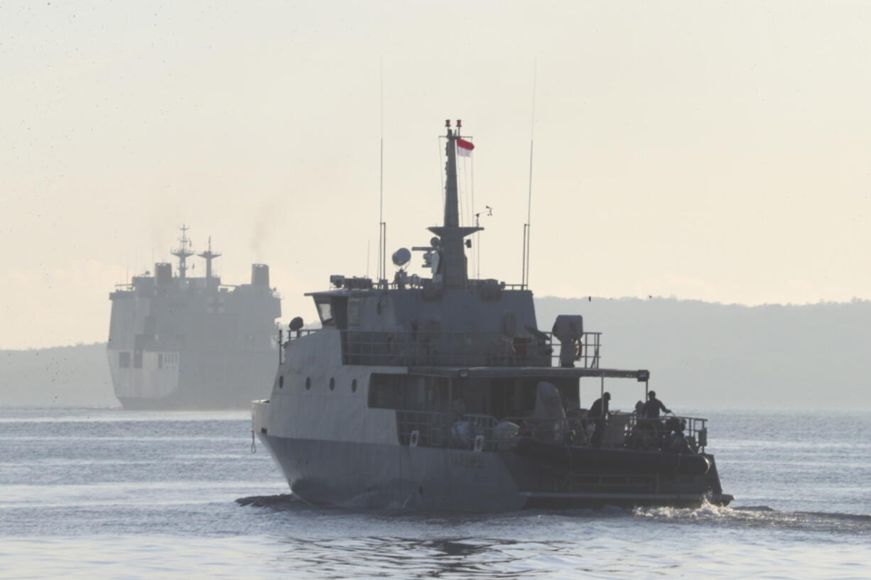 An Indonesian navy patrol ship sails to join the search for submarine KRI Nanggala that went missing while participating in a training exercise on Wednesday, off Banyuwangi, East Java, Indonesia, Saturday, April 24, 2021. The KRI Nanggala 402 went missing after its last reported dive Wednesday off the resort island, and concern is mounting it may have sunk too deep to reach or recover in time.