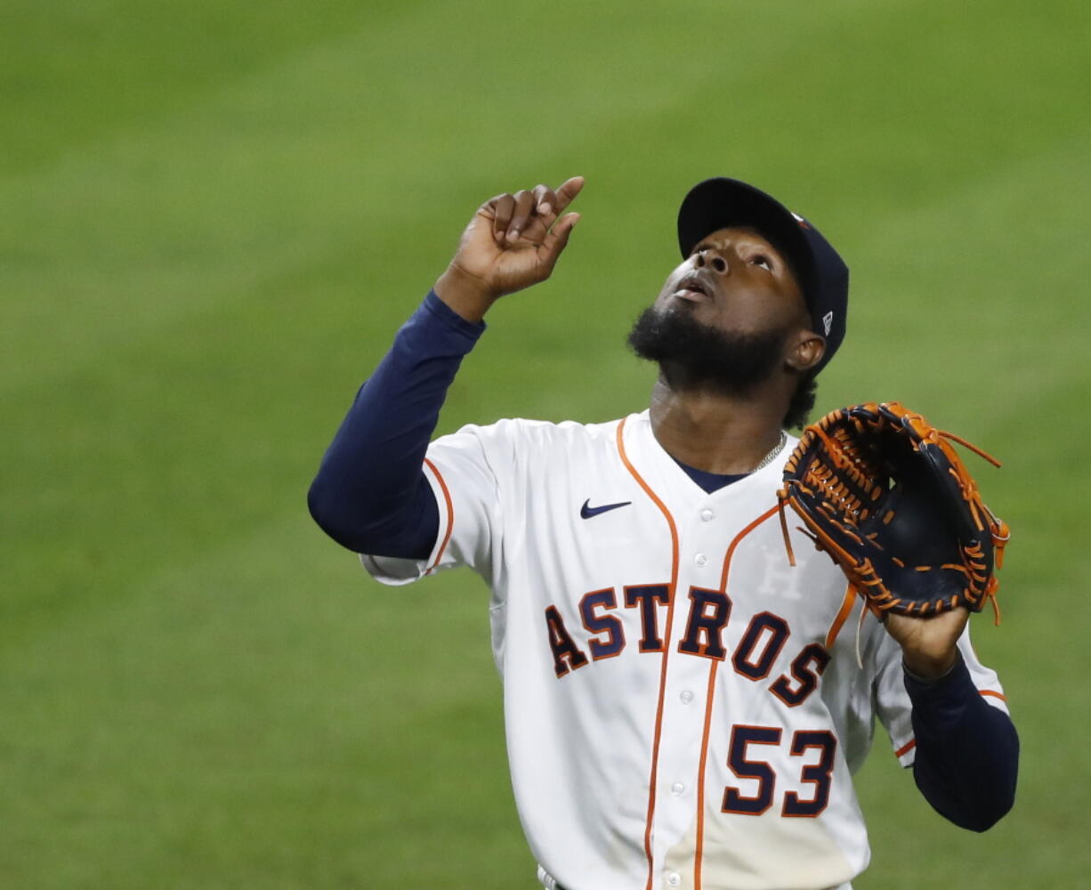 Houston Astros starting pitcher Cristian Javier celebrates after the top of the sixth inning against the Seattle Mariners in a baseball game Tuesday, April 27, 2021, in Houston. (Kevin M.