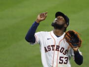 Houston Astros starting pitcher Cristian Javier celebrates after the top of the sixth inning against the Seattle Mariners in a baseball game Tuesday, April 27, 2021, in Houston. (Kevin M.