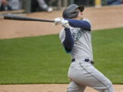 Seattle Mariners&#039; Kyle Seager hits a three-run home run against the Minnesota Twins in the ninth inning.