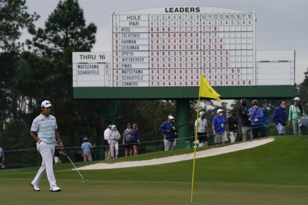 Hideki Matsuyama, of Japan, walks the the 17th green during the third round of the Masters golf tournament on Saturday, April 10, 2021, in Augusta, Ga. (AP Photo/David J.