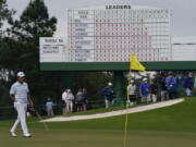 Hideki Matsuyama, of Japan, walks the the 17th green during the third round of the Masters golf tournament on Saturday, April 10, 2021, in Augusta, Ga. (AP Photo/David J.