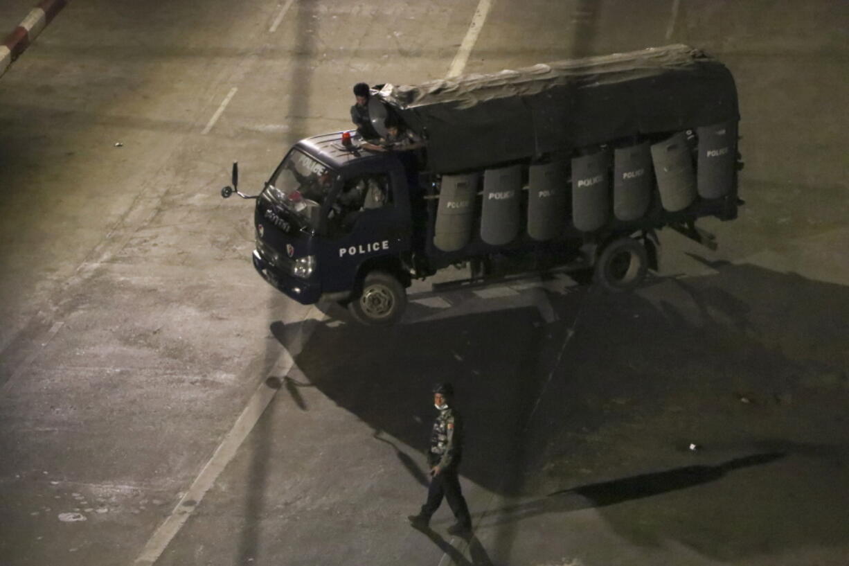 Police patrol on a truck along Hledan road at Kamaryouk township in Yangon, Myanmar, Thursday, April 1, 2021. Protesters in Myanmar on Thursday marked two months since the military seized power by again defying the threat of lethal violence and demonstrating against its toppling of the country&#039;s democratically elected government.