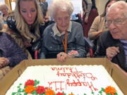 Thelma Sutcliffe is shown with a birthday cake in October 2019, in Omaha, Neb. Sutcliffe is now the oldest living American at 114 years old.