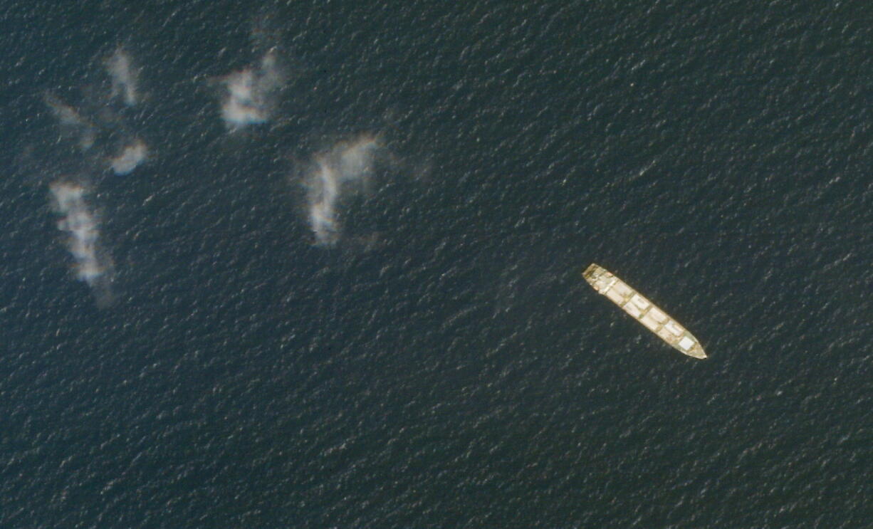 This Oct. 1, 2020, satellite photo from Planet Labs Inc. shows the Iranian cargo ship MV Saviz in the Red Sea off the coast of Yemen. The Iranian cargo ship, believed to be a base for the paramilitary Revolutionary Guard that has been anchored for years in the Red Sea off Yemen, has been attacked, Iranian state television acknowledged Wednesday, Wednesday, April 7, 2021. (Planet Labs Inc.