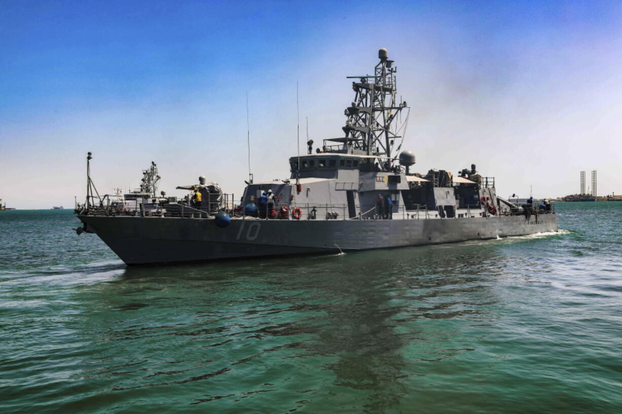 FILE - This April 14, 2020, file photo provided by the U.S. Army shows the USS Firebolt in Manama, Bahrain. The Firebolt fired warning shots when vessels of Iran's paramilitary Revolutionary Guard came too close to a recent patrol in the Persian Gulf, the U.S. Navy said Wednesday, April 28, 2021. (Spc. Cody Rich/U.S.