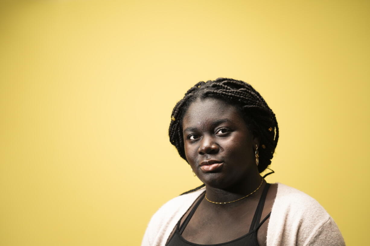 Ebele Azikiwe, 12, poses for a photograph in Cherry Hill, N.J., Wednesday, March 24, 2021. Azikiwe testified in October at state Assembly hearing, lending her support to legislation requiring New Jersey&#039;s school districts to add diversity to curriculums. Democratic Gov. Phil Murphy signed the bill into law.