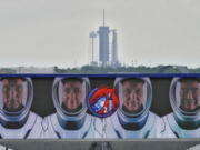 Members of the SpaceX Crew 2, from left, Thomas Pesquet, of the European Space Agency, NASA astronauts Megan McArthur, Shane Kimbrough, and Akihiko Hoshide, of the Japan Aerospace Exploration Agency, are shown on a video screen as the SpaceX Falcon 9 with the crew Dragon capsule sits on Launch Complex 39A Wednesday, April 21, 2021, at the Kennedy Space Center in Cape Canaveral, Fla. Four astronauts will fly on the SpaceX Crew-2 mission to the International Space Station scheduled for launch on April 23, 2021.