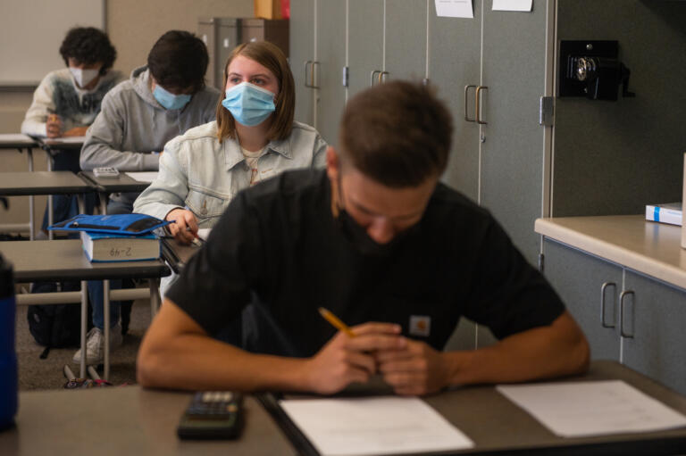 Students in Craig HardinÕs calculus class are seated at least three feet away from each other at Camas High School on Monday, April 19, 2021. Camas returned to four-day-a-week in-person instruction on Monday.