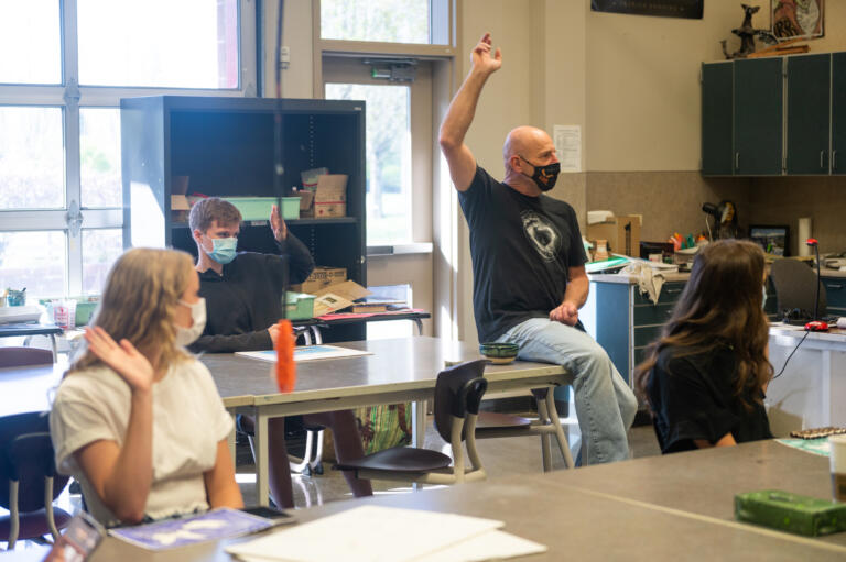 Rod Raunig, center, teaches a class called "Everything in Art" at Camas High School on Monday, April 19, 2021. Camas returned to four-day-a-week in-person instruction on Monday.