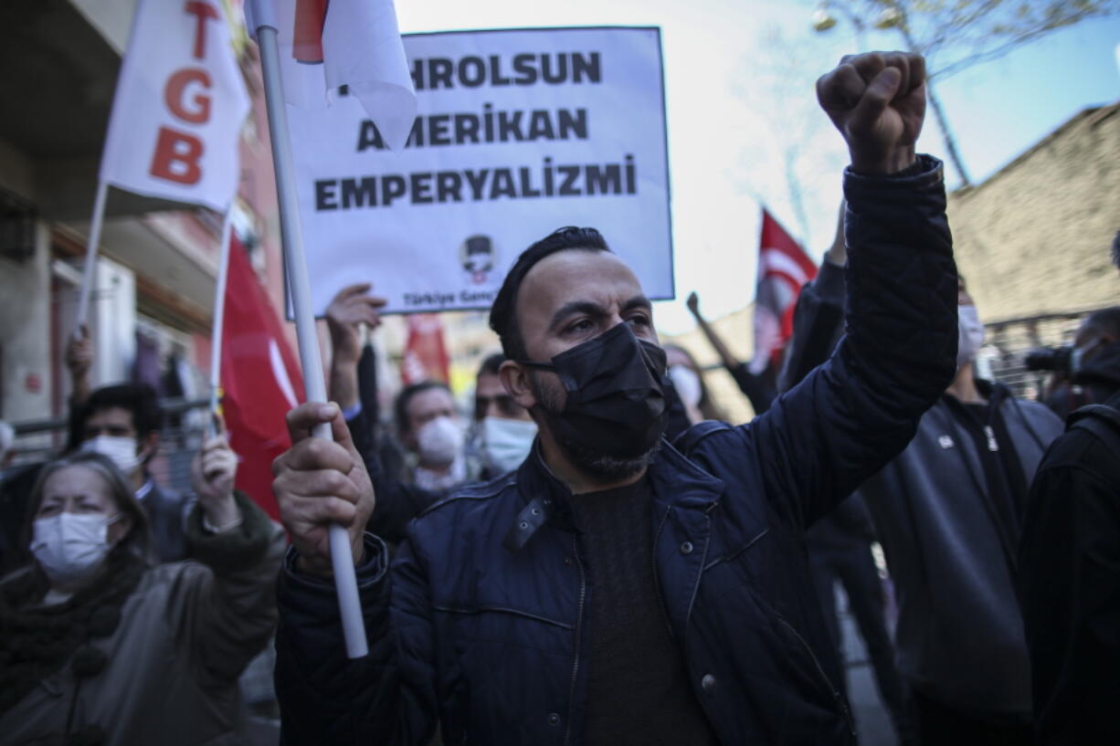 Supporters of the Turkey Youth Union chant slogans during a protest against U.S. President Joe Biden's statement, outside the U.S. consulate, in Istanbul, on Monday. On Saturday, Biden followed through on a campaign promise to recognize the events that began in 1915 and killed an estimated 1.5 million Ottoman Armenians as genocide.