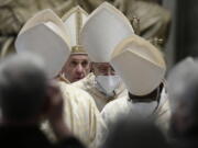 Pope Francis leaves after celebrating Easter Mass at St. Peter&#039;s Basilica at The Vatican Sunday, April 4, 2021, during the Covid-19 coronavirus pandemic.