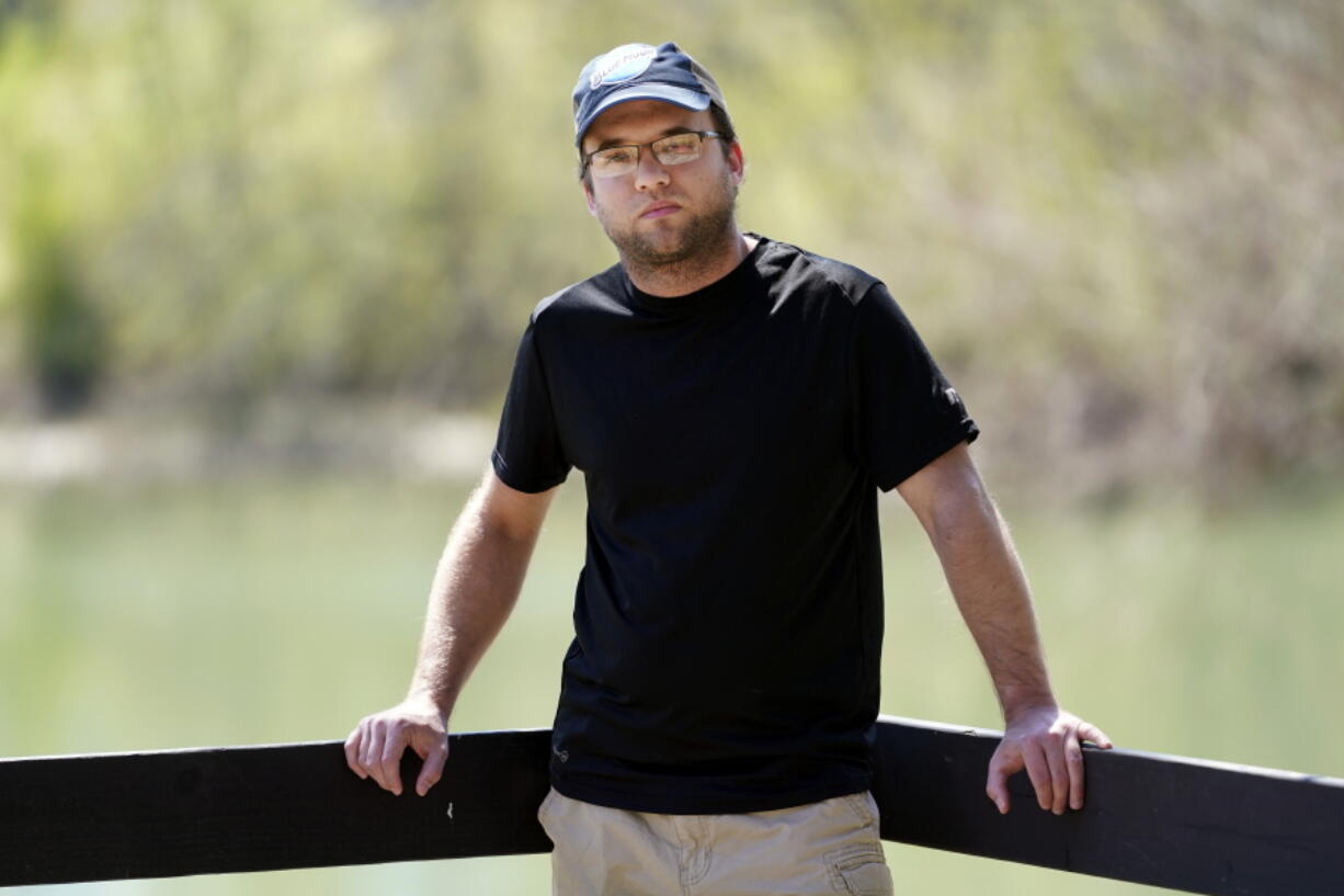 Daniel Roberts poses for a picture Monday, April 5, 2021, in McMinnville, Tenn. Roberts received a COVID vaccine over the objections of his family, who are against being vaccinated. &quot;Five hundred thousand people have died in this country. That&#039;s not a hoax,&quot; Roberts said, speaking of the conspiracy theories he hears from family and friends. &quot;I don&#039;t know why I didn&#039;t believe all of it myself.