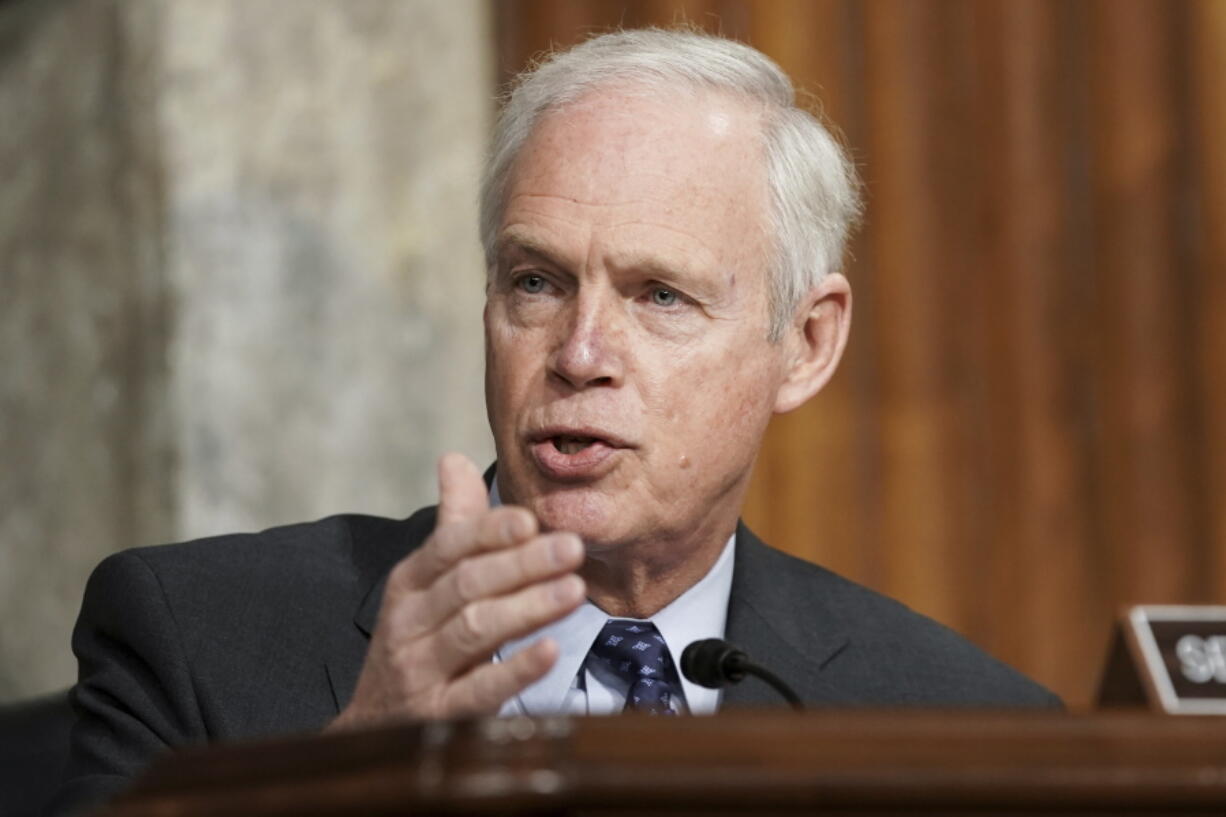 FILE - In this March 3, 2021 file photo, Sen. Ron Johnson, R-Wis., speaks at the U.S. Capitol in Washington.  Johnson, questioned the need for widespread COVID-19 vaccinations, saying in a radio interview "what do you care if your neighbor has one or not?" Johnson, who has no medical expertise or background, made the comments Thursday, April 22, during an interview with conservative talk radio host Vicki McKenna.