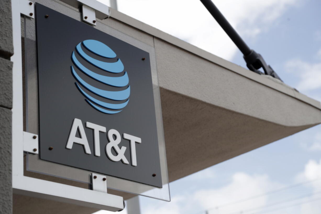 FILE - In this July 18, 2019, file photo, a sign is displayed at an AT&amp;T retail store in Miami. Corporations have given more than $50 million in recent years to state lawmakers who have seized on Donald Trump&#039;s lies about a stolen 2020 election to push for new restrictions on the right to vote. That&#039;s according to a new report by the government watchdog nonprofit Public Citizen. Telecom-giant AT&amp;T was the most prolific giver, donating over $800,000 since 2015 to authors of proposed restrictions, co-sponsors of such measures, or those who voted in favor of the bills, a new report by the Washington-based non-profit Public Citizen found.