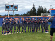 The Ridgefield softball team poses for a photo after beating Columbia River 15-5 on Saturday at Ridgefield High. The win clinched the 2A Greater St. Helens League title for the Spudders.