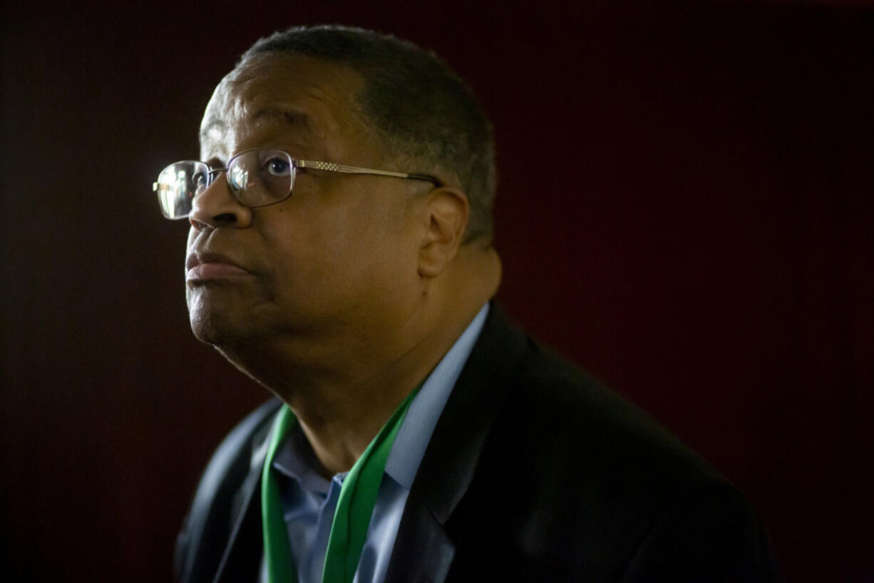 Larry Gossett, a former King County Council member, says his father was told he could not buy a house in West Seattle because of his race. Gossett is shown during his election night gathering at Emerald Community Church in Seattle.