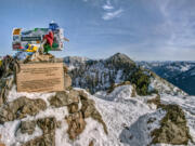 A Mailbox and Trekking Poles mark the Snowy Summit of Mailbox Peak in the Cascade Mountain Range.