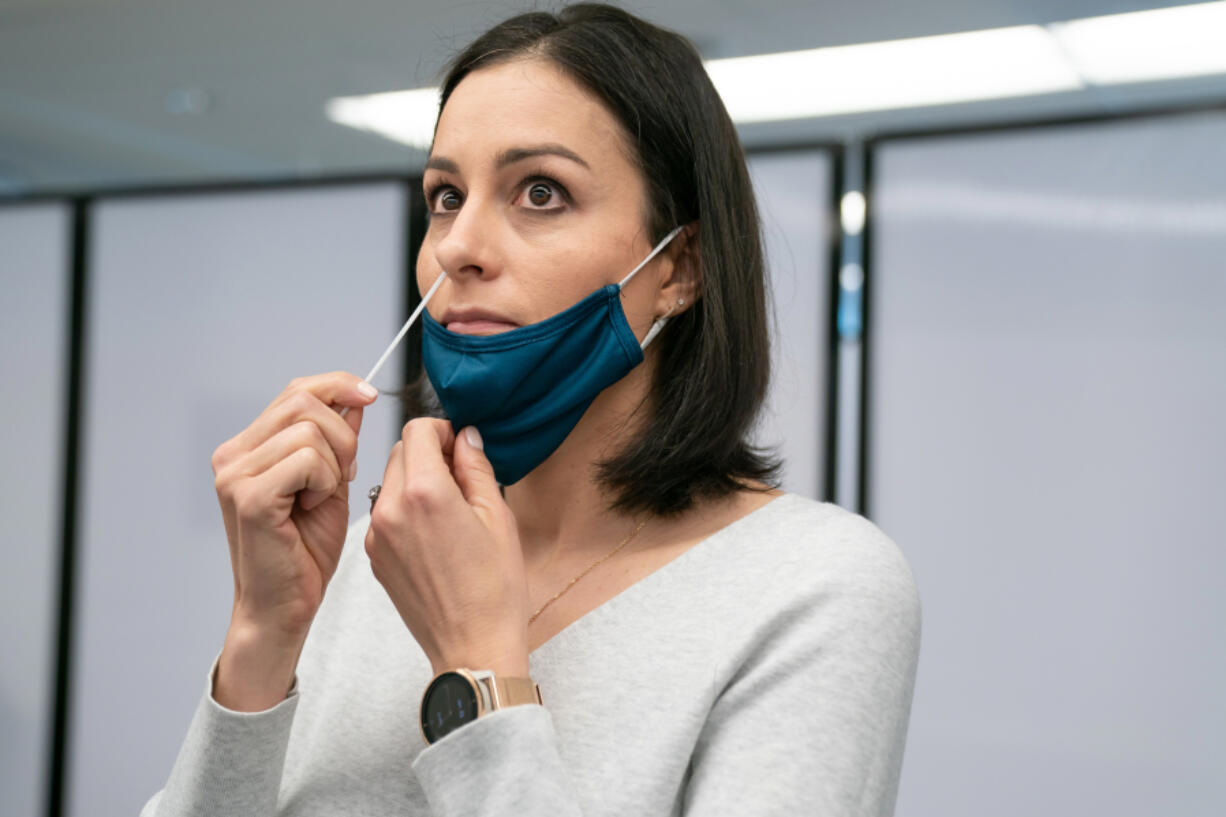 Abbott employee Alison Bakken prepares for her weekly COVID test on May 12, 2021. The company requires its own workforce to get tested weekly so the workforce can feel safe working side-by-side in the facility.