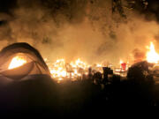 A fire destroyed a tent and other possessions at a homeless camp in east Vancouver early Monday morning.