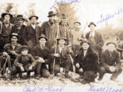 Before being elected the first Democratic sheriff in Clark County, Lester Wood (standing back row right) often worked in his father's business. Scott Wood ran a furniture business and auctioned farm equipment. After the conviction of his son's murderer, Scott Wood, distraught by the death penalty, hoped the governor might change it.