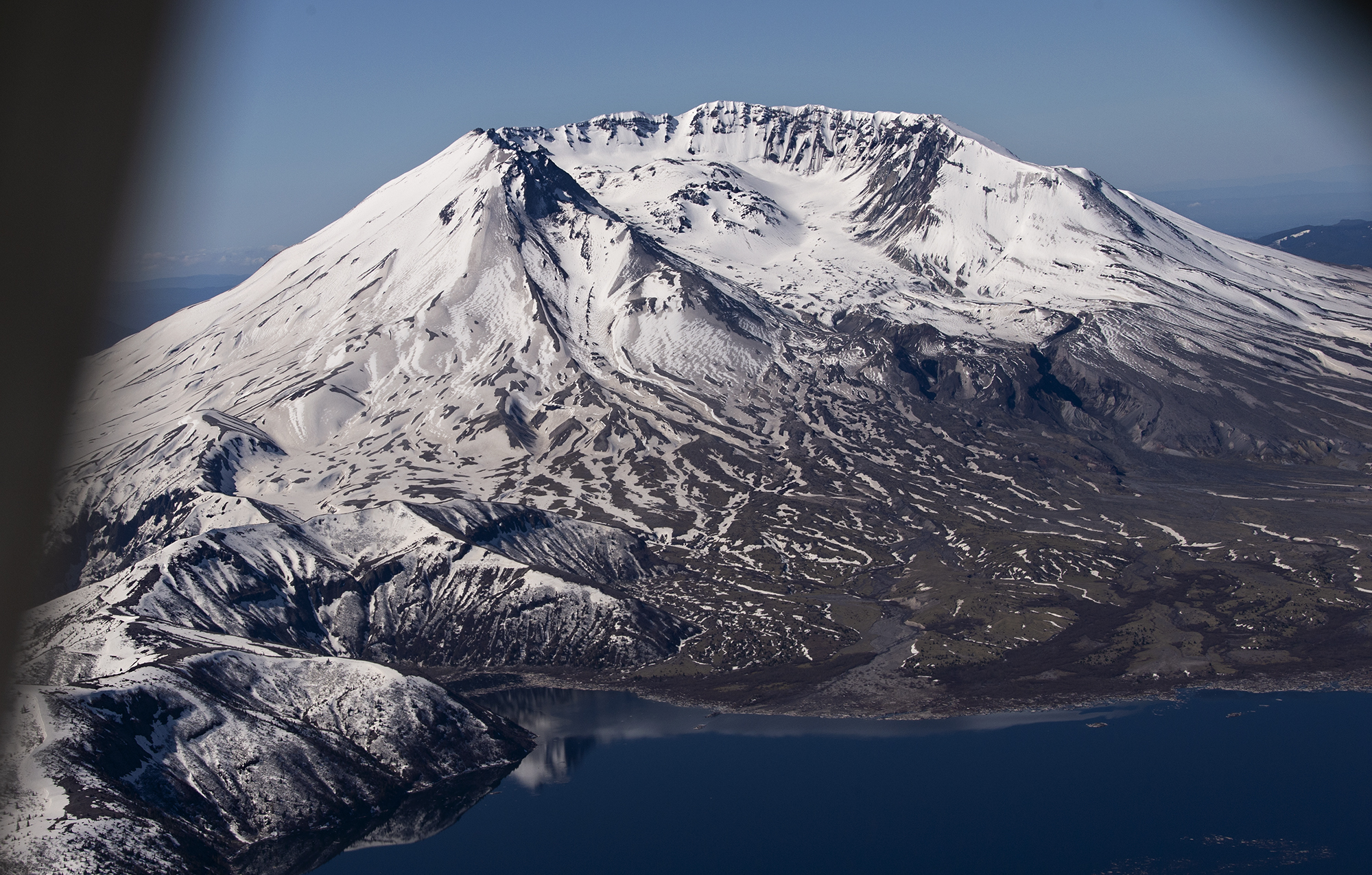 Clear skies light up Mount St. Helens, which is pictured from the air on Tuesday, May 11, 2021.