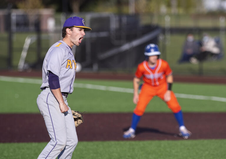 Ridgefield pitcher Nick Alder celebrates the final out, a strikeout, on Tuesday, May 4, 2021, at the Ridgefield Outdoor Recreation Complex. Columbia River won 4-2 to advance in the 2A Southwest District Tournament.