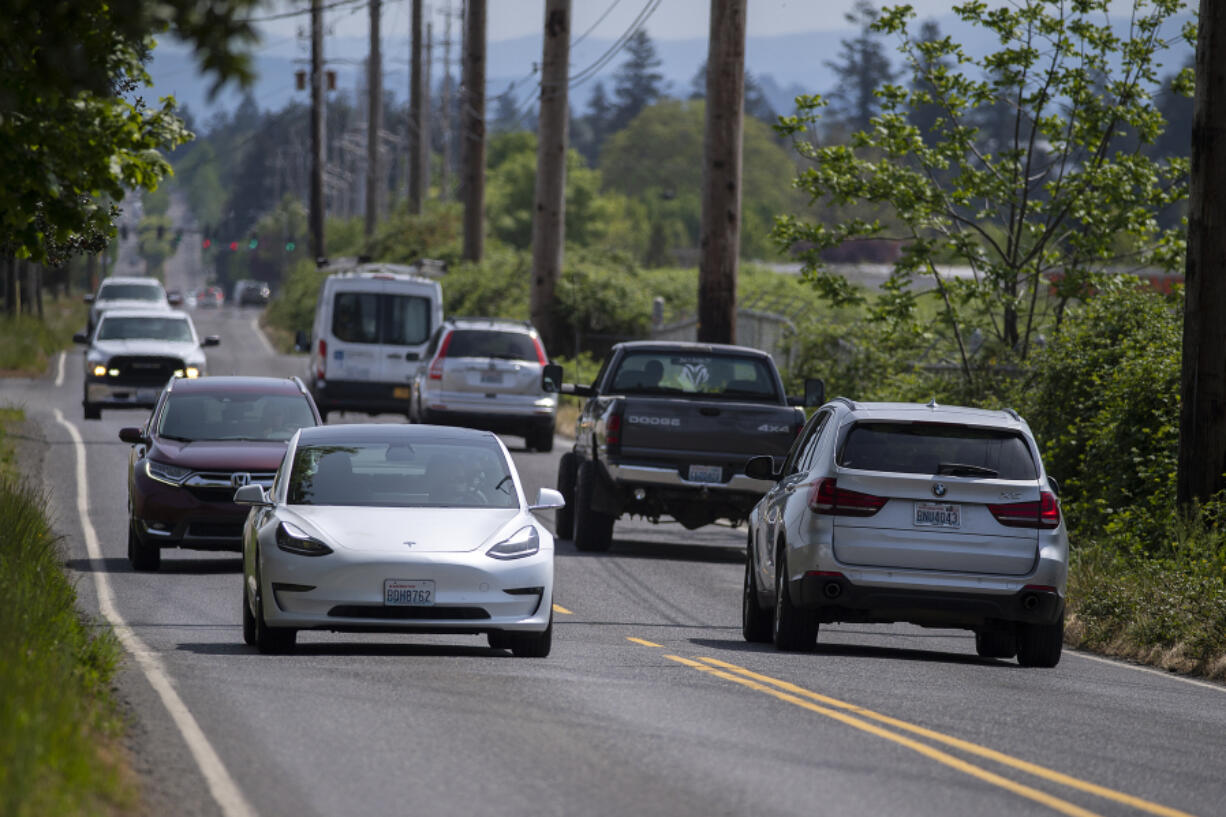 Drivers navigate a narrow section of Southeast First Street. Vancouver's new Transportation and Mobility Commission created a list of the city's transportation priorities over the next five years, with the First Street build-out at the top of the list.