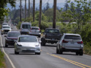 Drivers navigate a narrow section of Southeast First Street. Vancouver's new Transportation and Mobility Commission created a list of the city's transportation priorities over the next five years, with the First Street build-out at the top of the list.