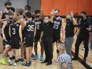 Members of the Union basketball team thank Battle Ground for a good game following their win at Battle Ground High School on Tuesday night, May 11, 2021.