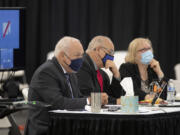 Plaintiffs Don Benton, from left, Christopher Clifford and Susan Rice wait to hear testimony Monday from former Clark County manager Mark McCauley in the trial for a lawsuit brought by them, at the Clark County Event Center at the Fairgrounds.