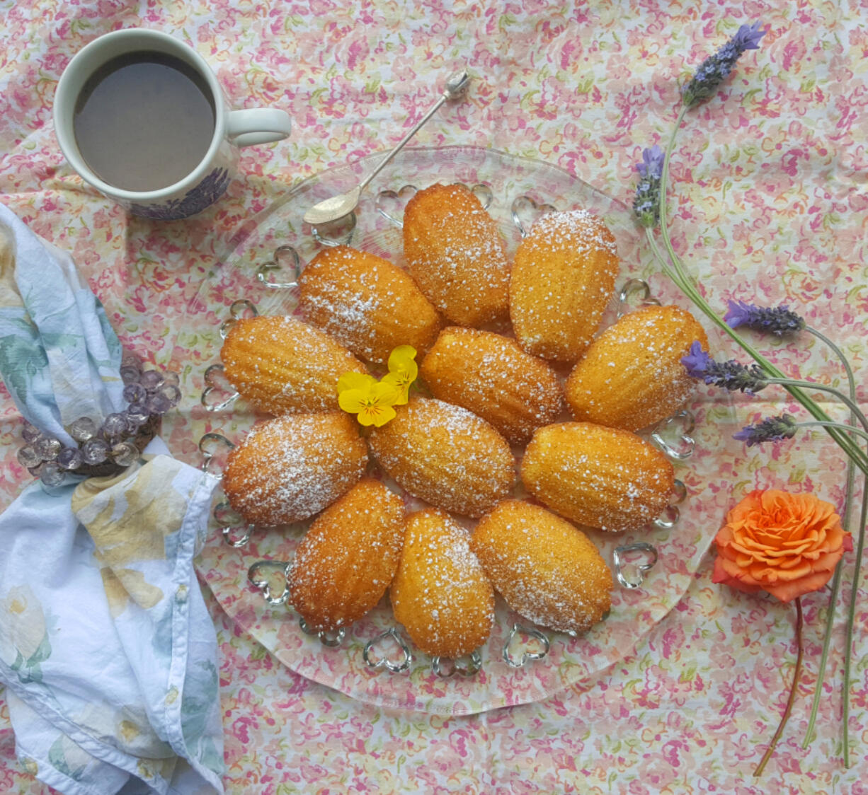 Enjoy a warm, buttery madeleine straight from the oven with a cup of strong French coffee.