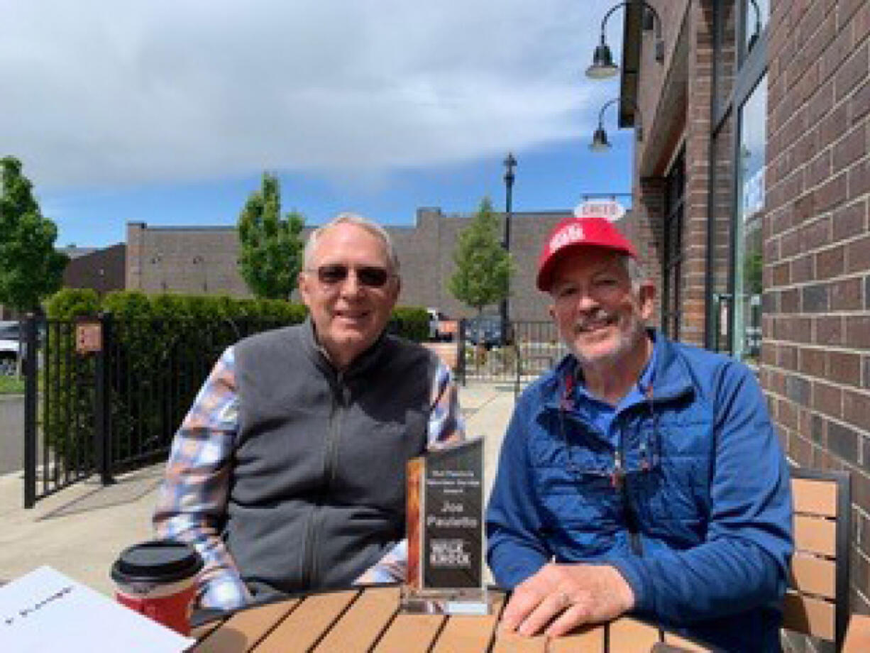 CLARK COUNTY: Joe Pauletto, left, received the Walk & Knock Bud Pasmore Volunteer Achievement Award from organization President Tom Knappenberger.