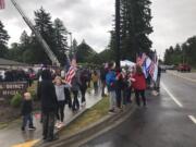 Parents gather outside the Washougal School District headquarters Tuesday night before a school board meeting.