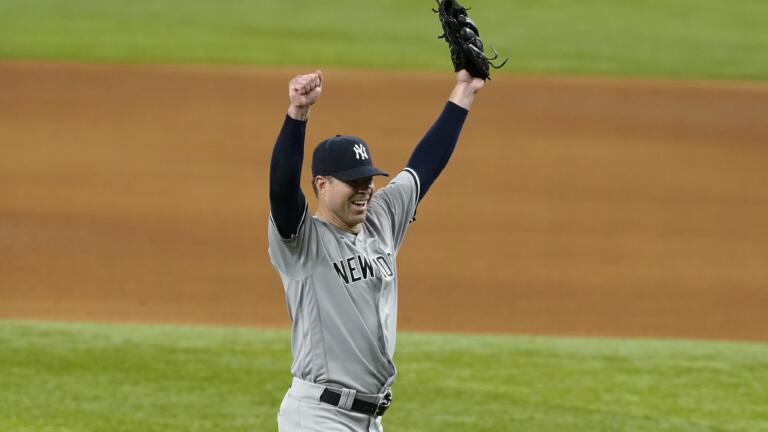 New York Yankees starting pitcher Corey Kluber celebrates his no-hitter against the Texas Rangers in a baseball game in Arlington, Texas, Wednesday, May 19, 2021.